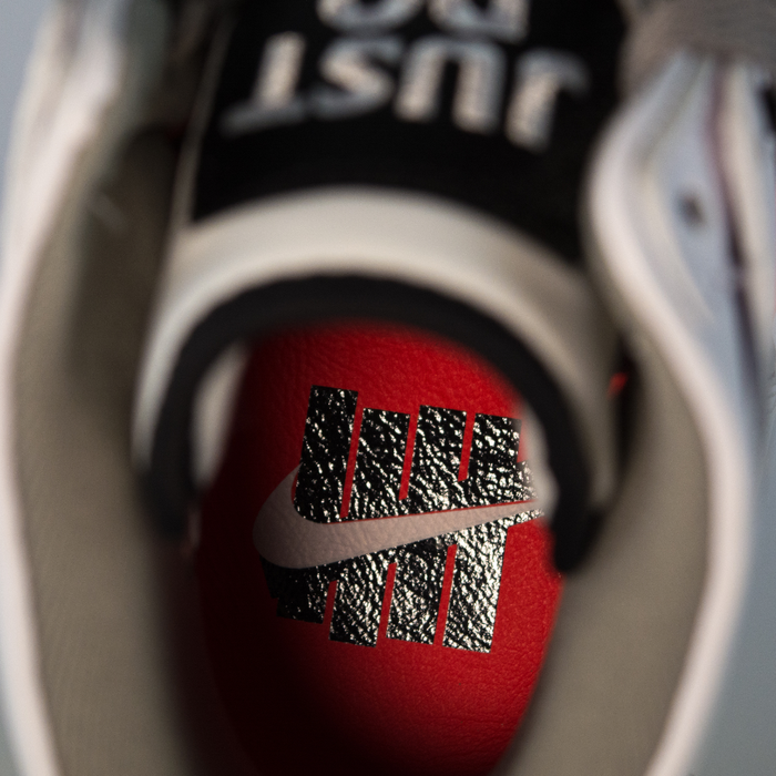 Buty Nike Dunk Lux UNDFTD white / infrared - black (826668-160) TM